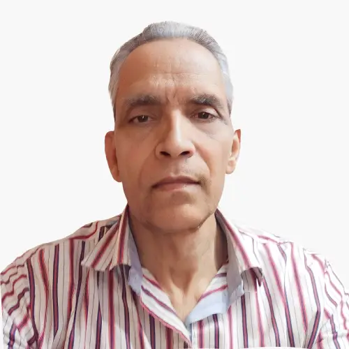 Self-portrait of a middle-aged man with short gray hair wearing a red-and-white striped shirt, looking directly at the camera.