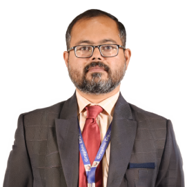 Portrait of a man with glasses in a dark suit and red tie, wearing a blue conference lanyard.
